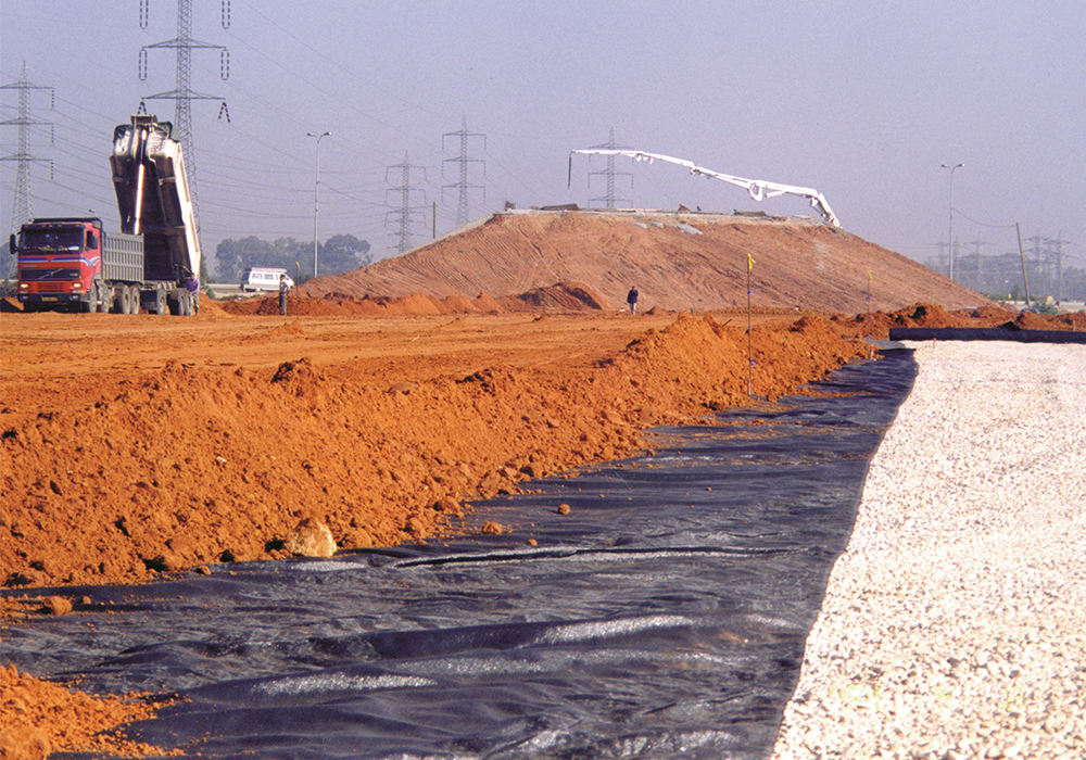 Drainage, separation and reinforcement of sub-bases by geotextile